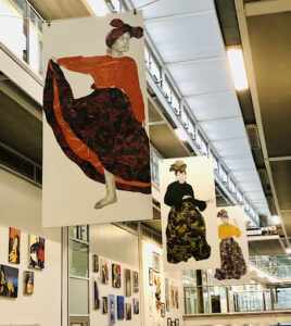 Large banner images of women in old fashioned dresses
